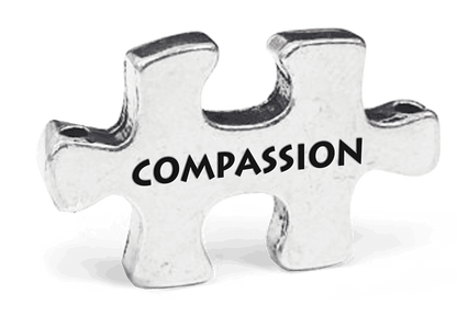 Compassion Puzzle Token on Key Loop